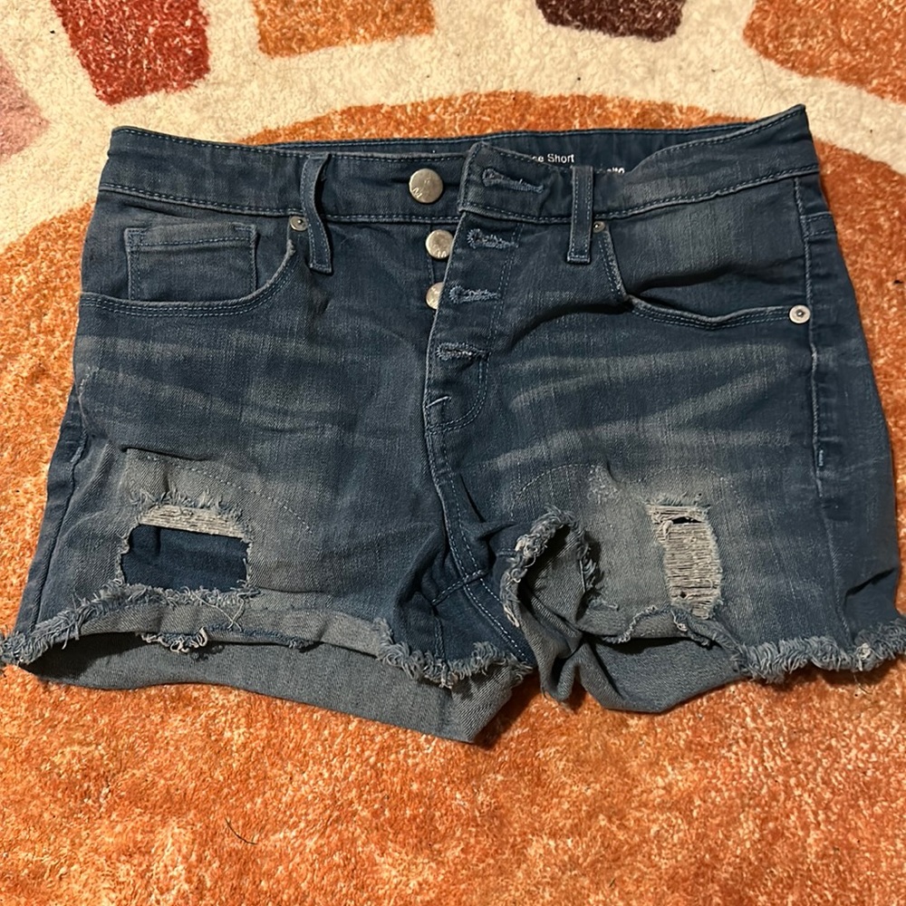 High waisted jean shorts with patched up rips